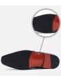 Black smooth leather Chelsea boots with side elastics, slip-on design, pointed toe, heel, and back pull tab.