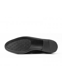 Black velvet slippers with embroidery detail, round toe, and refined finishes.