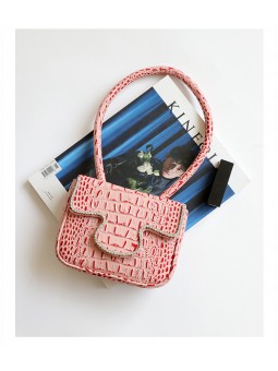Handbag with top handle in genuine pink crocodile-effect leather, crafted from cowhide leather.