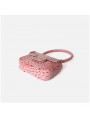 Handbag with top handle in genuine pink crocodile-effect leather, crafted from cowhide leather.
