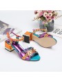Multicolored block-heeled sandals with an open toe, strap and buckle closure. Leather insole for ultimate comfort.
