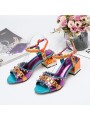 Multicolored block-heeled sandals with an open toe, strap and buckle closure. Leather insole for ultimate comfort.