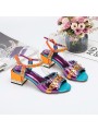 Multicolored block-heeled sandals with an open toe, strap and buckle closure. Leather insole for ultimate comfort.