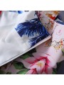 Abito estivo lungo multicolore con spalline, arricchito da una stampa patchwork di arabeschi e righe