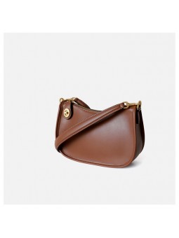 Retro brown cowhide leather shoulder bag. Top zipper closure, adjustable and detachable leather strap with buckle.