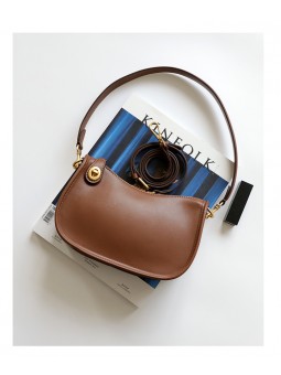 Retro brown cowhide leather shoulder bag. Top zipper closure, adjustable and detachable leather strap with buckle.