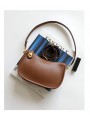 Retro brown cowhide leather shoulder bag. Top zipper closure, adjustable and detachable leather strap with buckle.