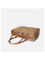 arge braided smooth leather tote bag in apricot. Gold finish and adjustable strap. Subtle freshness.