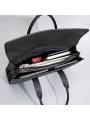 Maletín de auténtico cuero negro tejido a mano, con dos asas superiores para un transporte elegante y cómodo