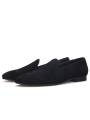 Slippers de terciopelo negro con efecto acolchado, bordes de grosgrain, empeine dentada y punta redonda.