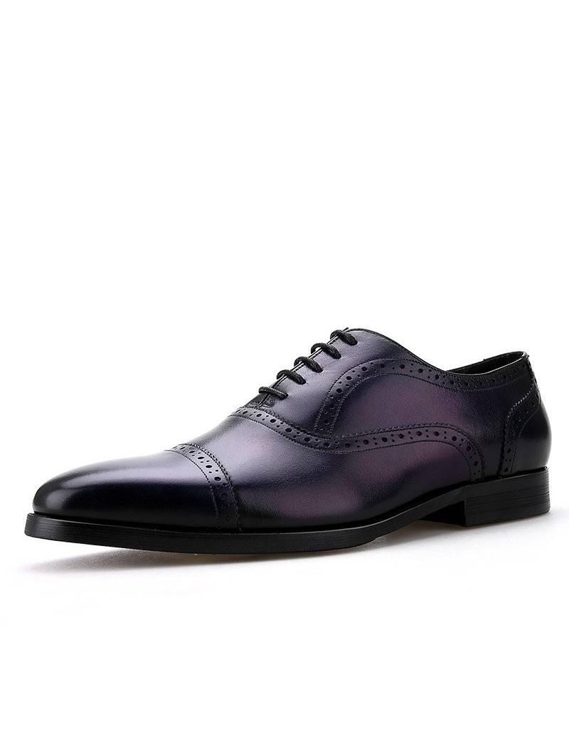 Richelieu en cuir bleu à bout droit, perforations et laçage 5 œillets.