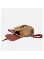 Beige two-tone women’s bag with leather handle, drawstring and belted flap closure.