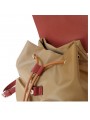 Sac femme bi-matière beige, poignée en cuir, double fermeture avec cordons et rabat ceinturé.