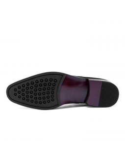 Bottines Chelsea en cuir lisse noir, à enfiler avec élastiques latéraux, bout droit, talon discret et languette arrière.
