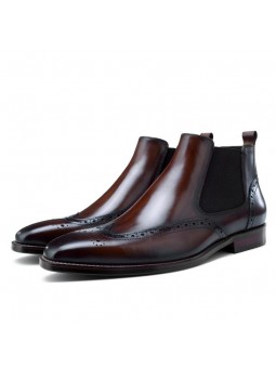 Stivaletti Chelsea in pelle marrone sfumata, stile slip-on con dettagli brogue, punta dritta e tacco.