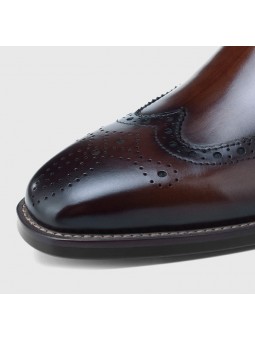 Bottines Chelsea en cuir marron dégradé, à enfiler, avec détails brogues, bout droit et talon.