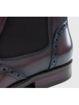 Bottines Chelsea en cuir marron dégradé, à enfiler, avec détails brogues, bout droit et talon.