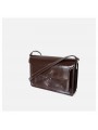 Vintage brown leather shoulder bag, featuring a metal clasp on the flap. Worn on the shoulder with an adjustable leather strap.