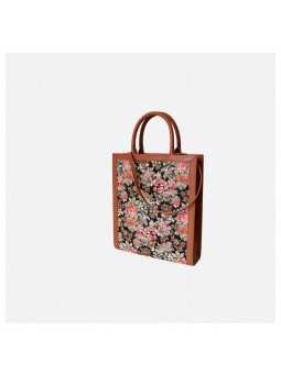 Vertical tote bag in brown floral jacquard with two top handles and a snap button closure.