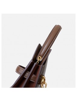 Borsa tote in pelle marrone con dettaglio in suede, multi-scomparti e chiusura con cinturini.