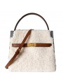 White handbag in shearling and cowhide leather, interior button closure and patch pockets, gold finish.