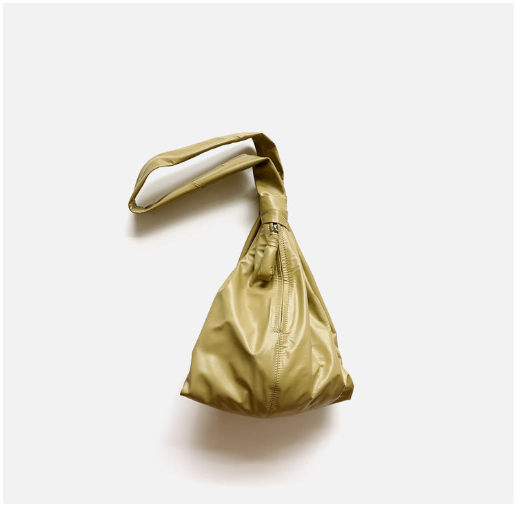 Sac croissant en cuir de vachette pleine fleur pour homme et femme, coloris beige, taille petits et grands ,vue de coté