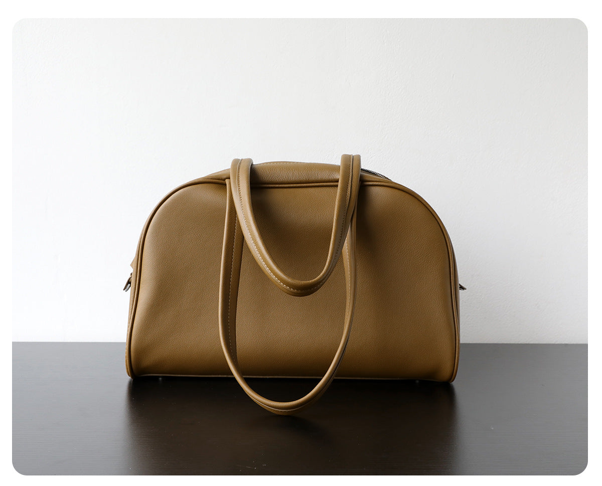 Sac fourre-tout femme cuir pleine fleur, sac vintage intemporel haut de gamme, coloris olive, vue frontale du dos