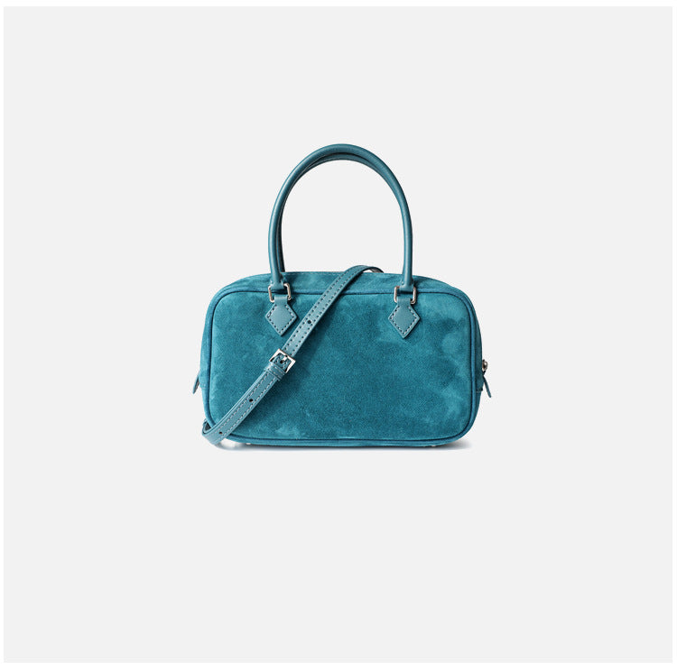 Sac à main femme en cuir suede, tote bag élégant et spacieux, porté à l’épaule, parfait pour le quotidien, coloris bleu, vue frontale