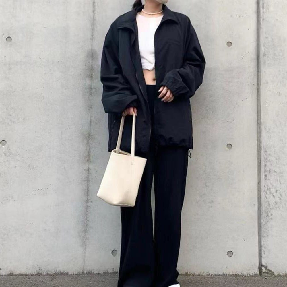 Sac seau en cuir pour femme – Grande capacité, coloris beige, vue frontale.