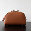 Trousse_de_toilette_cosm_tique_en_cuir_coloris_marron_vue_frontale 